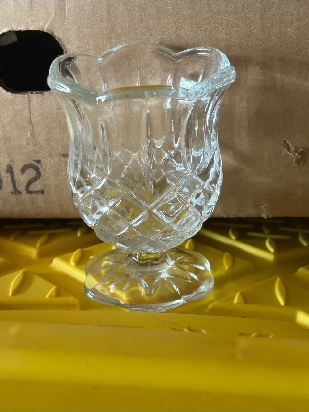 vintage Homco tulip-shaped glass votive holder featuring a diamond cut pattern.